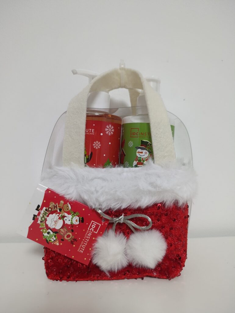 🎅✨ Set de Cuidado Corporal IDC Institute - Bolso Festivo de Lentejuelas Roja y Pelo Blanco ✨🎁